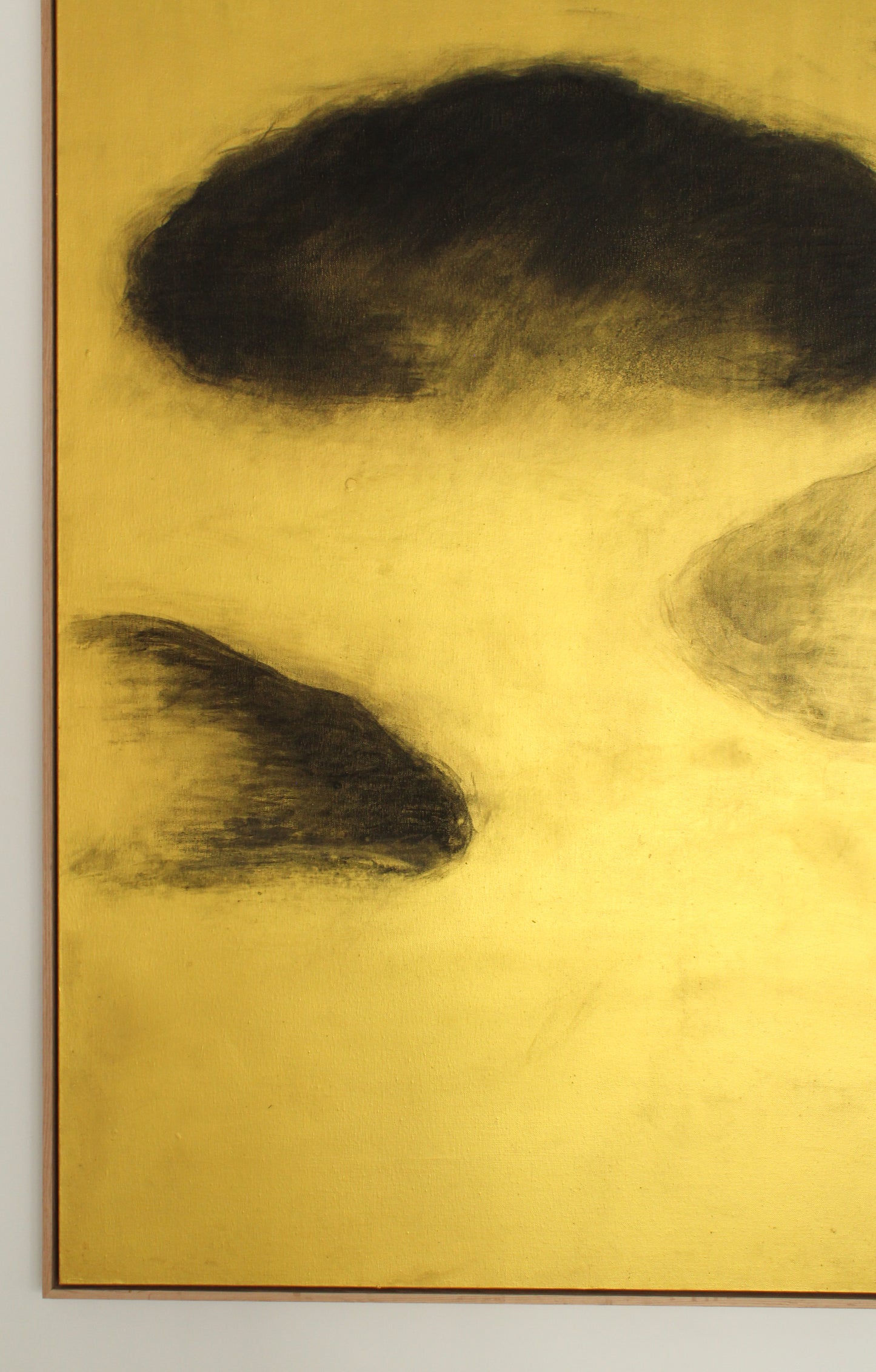 Black clouds on a gold background