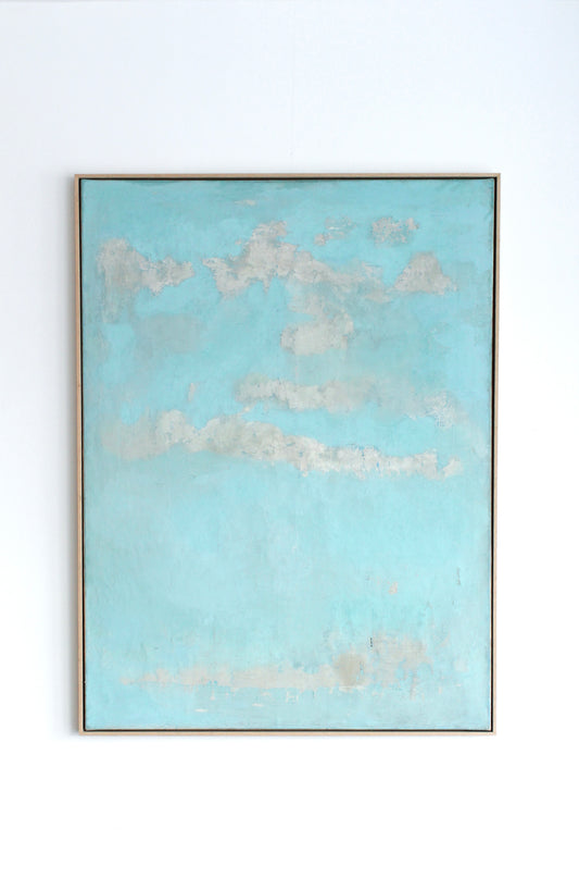 White clouds on a blue sky background