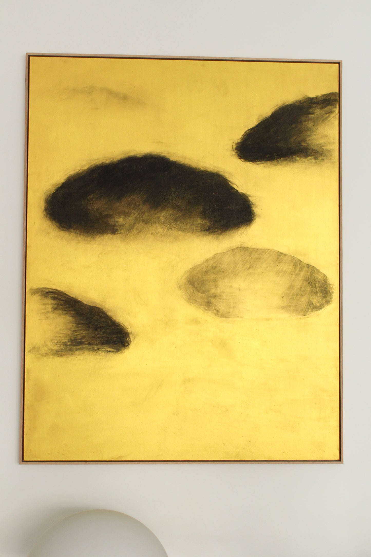 Black clouds on a gold background