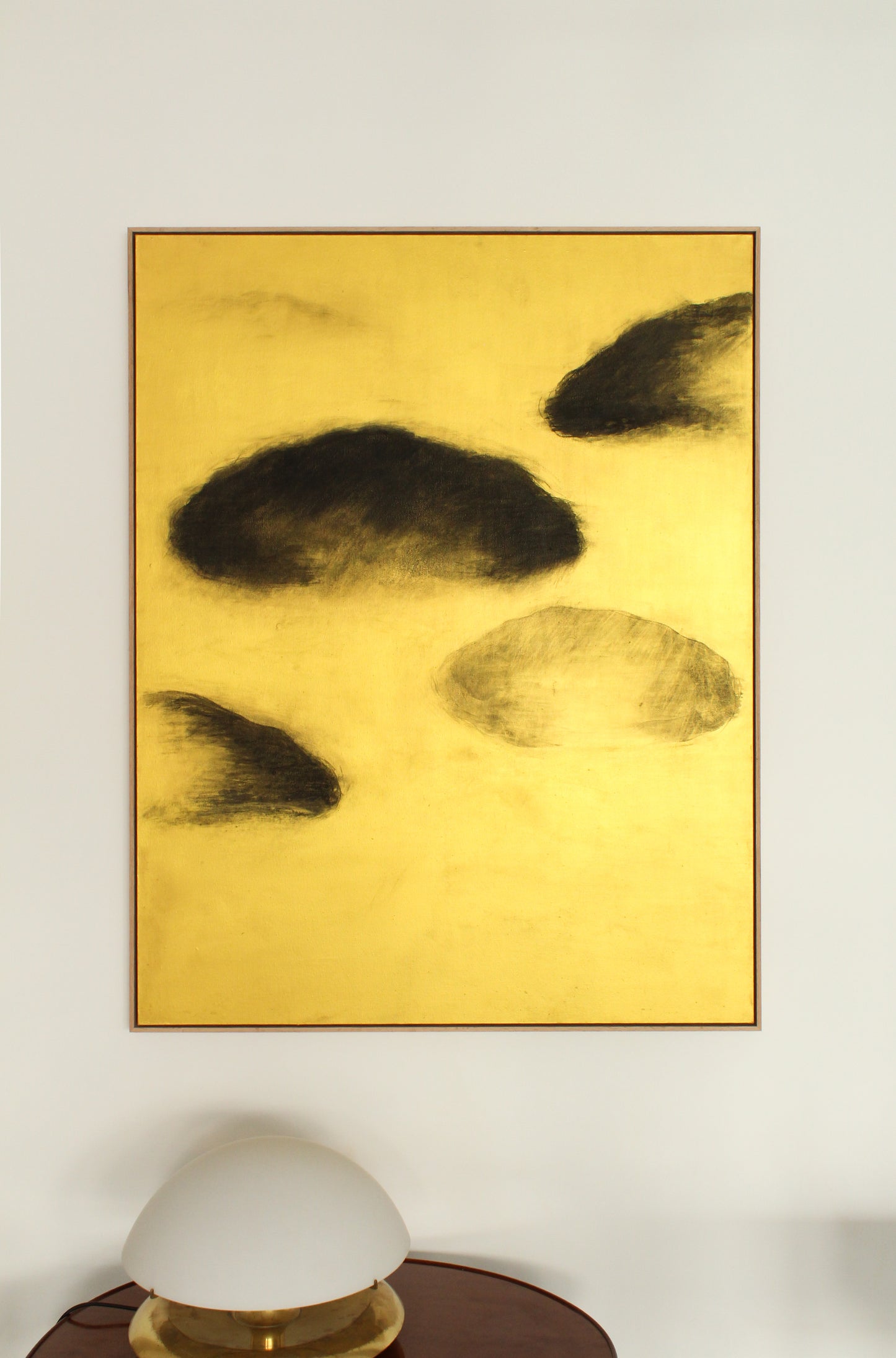 Black clouds on a gold background