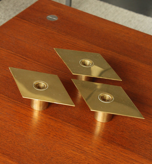 SIGURS PERSSON - Suite of three candlesticks